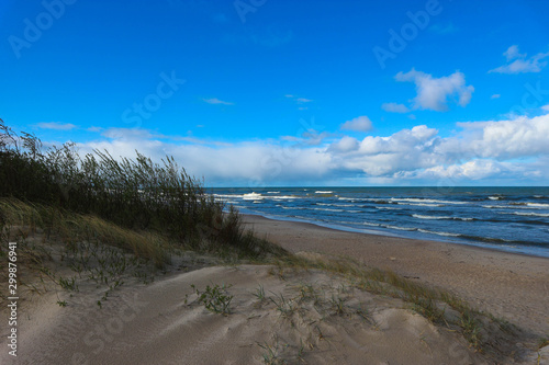 Fototapeta Naklejka Na Ścianę i Meble -  Waves, blue sky and baltic sea sand dunes, Palanga, Lithuania