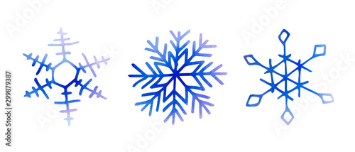 Collection of artistic blue snowflakes with watercolor texture. Stock vector set. Can be used for printed materials, prints, posters, cards, logo. Abstract background. Hand drawn decorative elements. 