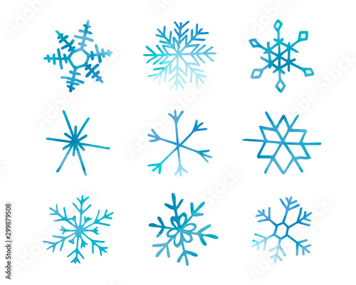 Collection of artistic blue snowflakes with watercolor texture. Stock vector set. Can be used for printed materials, prints, posters, cards, logo. Abstract background. Hand drawn decorative elements. 