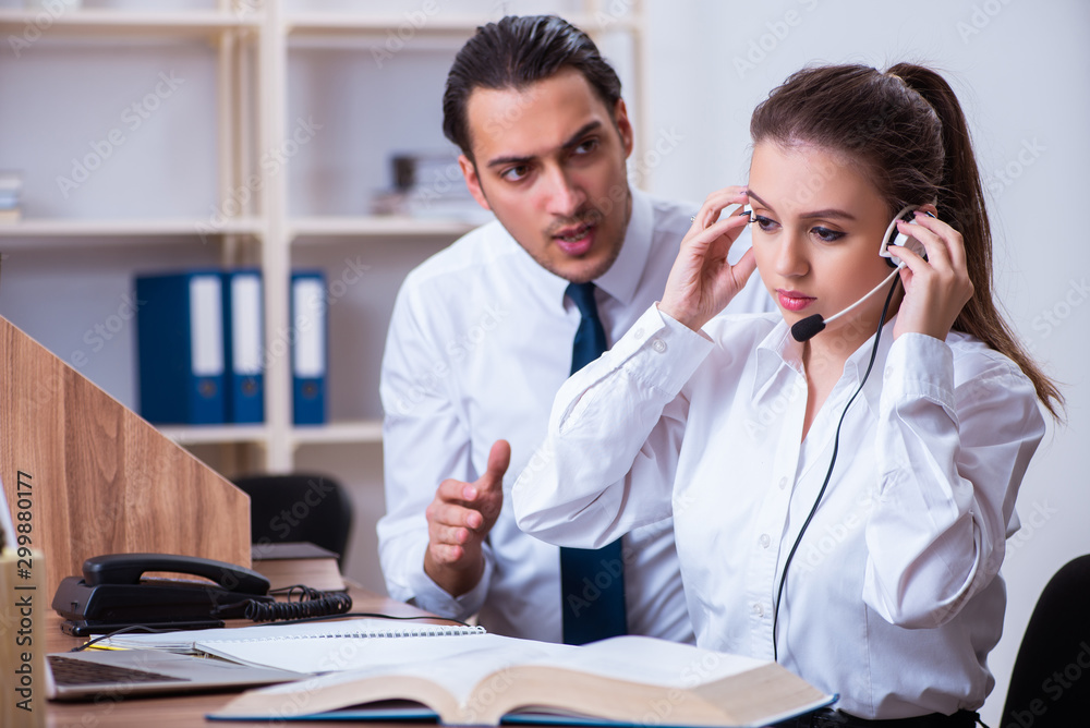 Call center operators working in the office