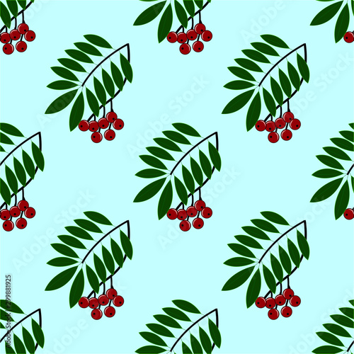 Cute festive pattern with rowan branch and green leaves on a blue background.