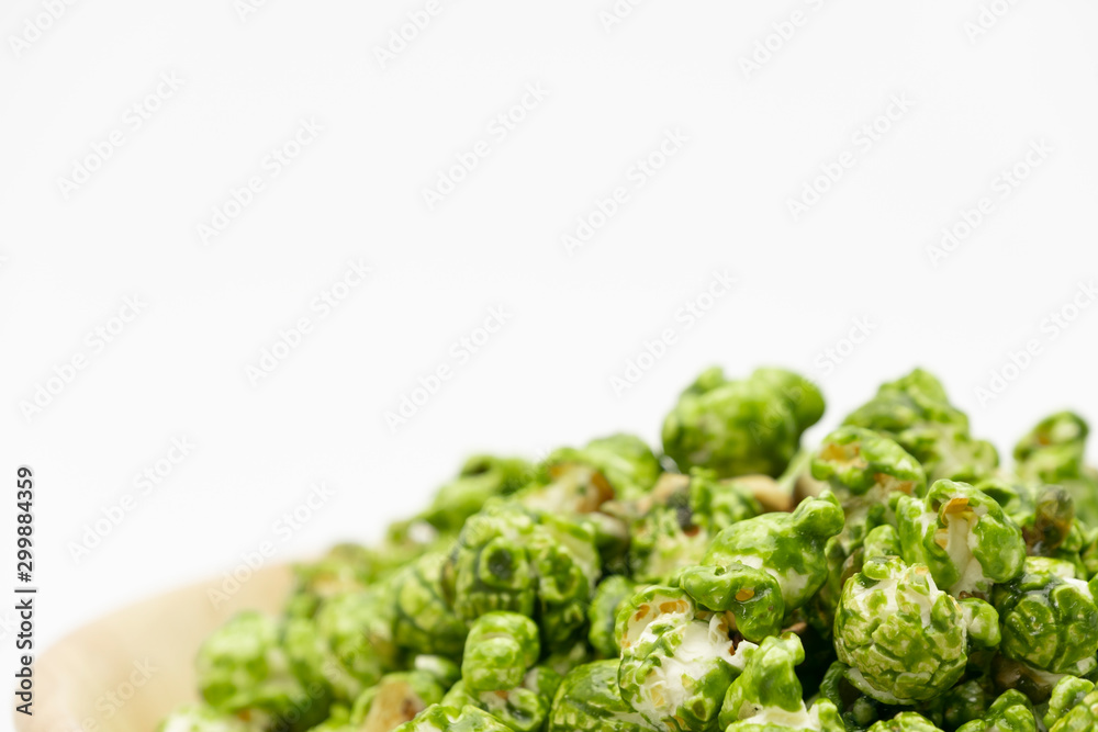Lush of Japanese matcha green tea popcorn with white background for copy space text, Popular snack with favorite movie Lush of Japanese matcha green tea popcorn with white background for copy space text, Popular snack with favorite movie