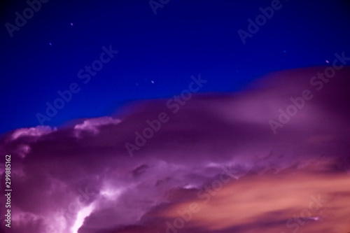 Storm Cloud Illuminated by Lightning