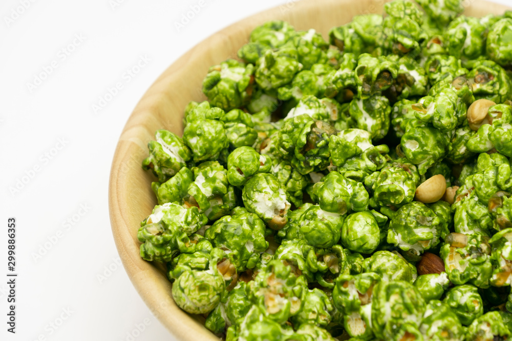 Top view the lush of Japanese matcha green tea popcorn with white background for copy space text, Popular snack with favorite movie Top view the lush of Japanese matcha green tea popcorn with white background for copy space text, Popular snack with favorite movie