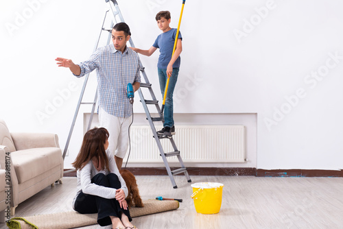 Young family doing home renovation photo