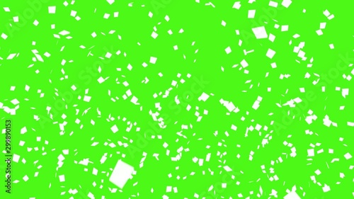  Animation of white confetti poppers explosions 4K with copy space. on green background,party concept.