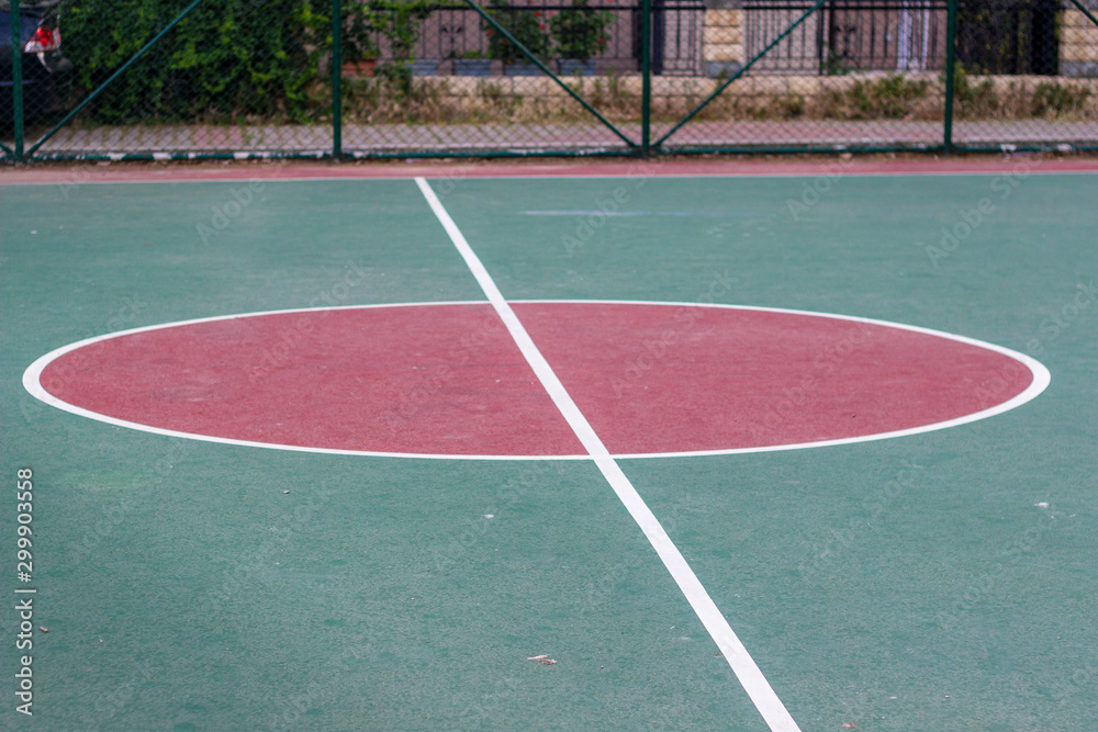 Fototapeta premium Perspective shoot of street basketball hall middle center circle