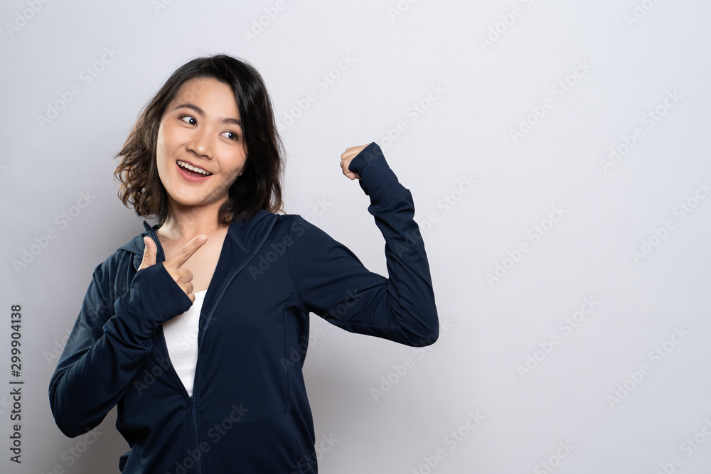 Portrait of a healthy woman present the copy space isolated over white background Portrait of a healthy woman present the copy space isolated over white background