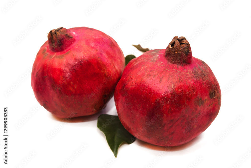 winter fruit, red pomegranate isolated on white winter fruit, red pomegranate isolated on white