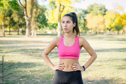 Candid shot of woman resting after workout