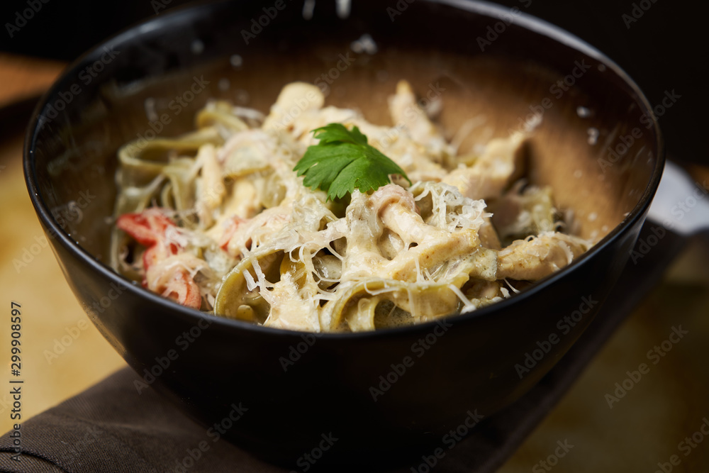 Spinach pasta salad with cheese, paprika, chicken, parsley. Spinach pasta salad with cheese, paprika, chicken, parsley.