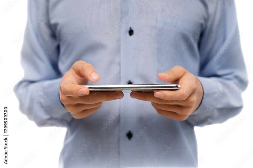 Unrecognizable man holding smartphone in horizontal orientation playing video games Unrecognizable man holding smartphone in horizontal orientation playing video games
