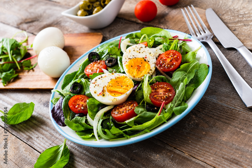 Salad with boiled egg and vegetables