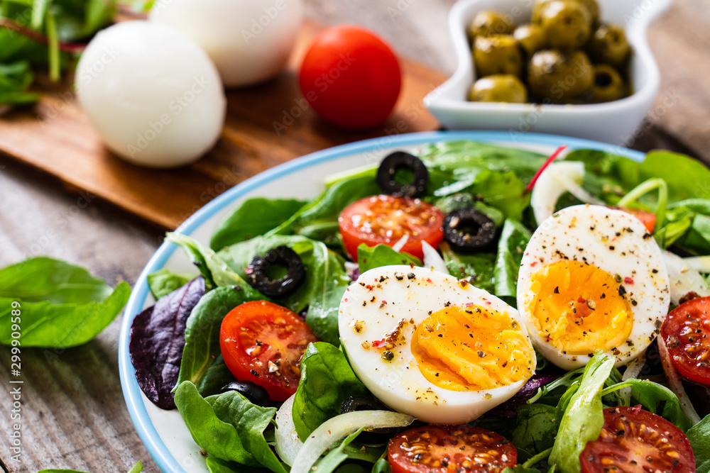 Salad with boiled egg and vegetables Salad with boiled egg and vegetables