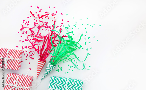 Celebration anniversary and party concepts ideas with colorful gift box present and confetti element on white color background