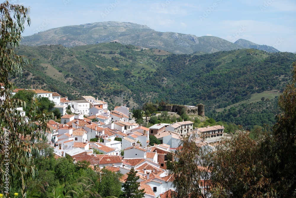 View over village rooftops towards the mountains, Benadalid, Spain.