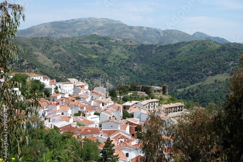 View over village rooftops towards the mountains, Benadalid, Spain.