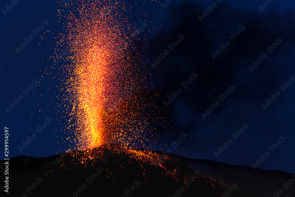 explosive eruption at dusk in one of the three craters of the active stromboli volcano, eolian islands, italy. - obrazy, fototapety, plakaty 