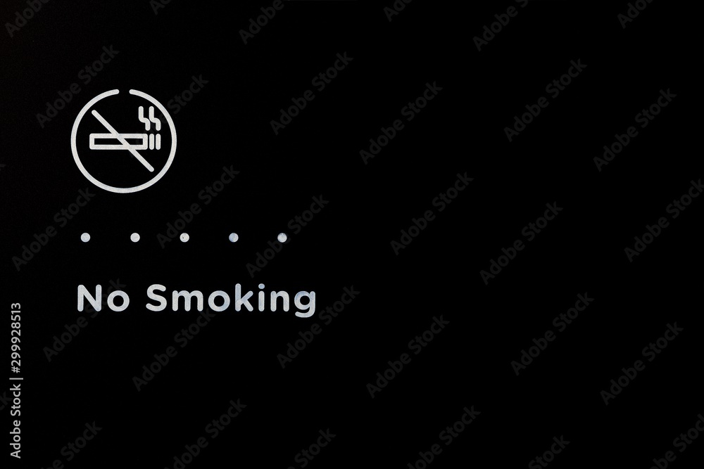 Sign of don’t smoke and no smoking word white color on black background. Sign of don’t smoke and no smoking word white color on black background.