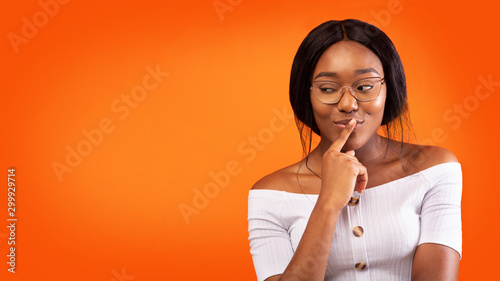 Photos Afro Girl Thinking About Something Standing Over Orange Background, Panorama