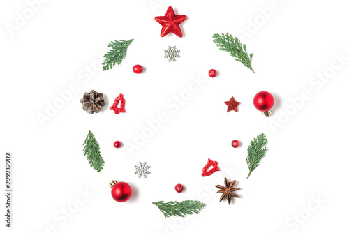 Christmas composition. Christmas wreath made of fir tree branches, decorations, berries isolated on white background