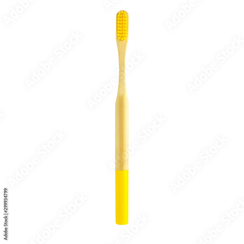 Toothbrushes of different colors isolated on white background.wooden tooth isolated on white background.eco-friendly bamboo toothbrushes colorful toothbrushes stand in clear glass for the whole family