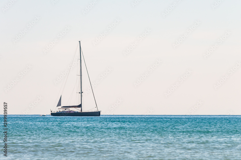 Sailing yacht in the Tyrrhenian sea waters near the Porto Ercole in the Province of Grosseto, Tuscany
