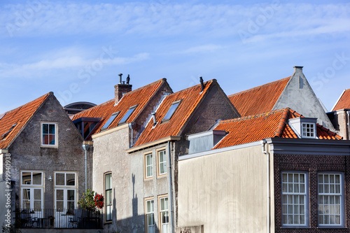 Historic buildings with red roof tiles in Dordrecht