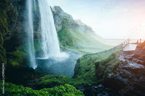 Perfect view of powerful Seljalandsfoss waterfall in sunlight. Location place Iceland, Europe.