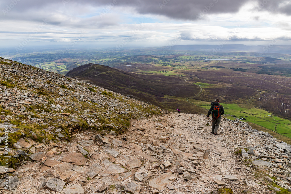 Hiking with Trail, Rocks and vegetation at Croagh Patrick mountain