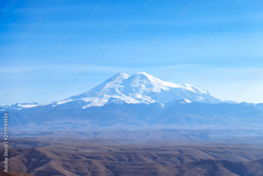 Mount Elbrus Snowy peak. Nature and mountains landscape of North Caucasus.