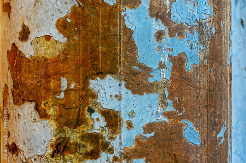 abstract art wallpaper from rusty metal with blue background.