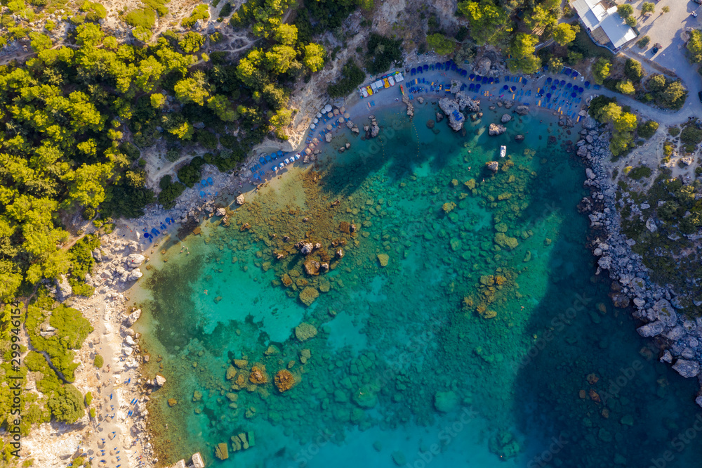 picturesque Bay of sea with beach rocks and stones, clear turquoise water, view from the drone