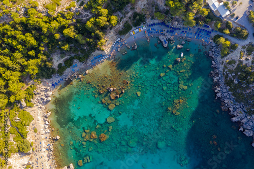 picturesque Bay of sea with beach rocks and stones, clear turquoise water, view from the drone © vladimircaribb