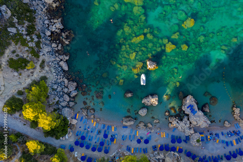 Anthony Quinn Bay. The most beautiful beach at Rhodes island. bird s eye view from above  rocks  clear sea  beach and Bay with people.