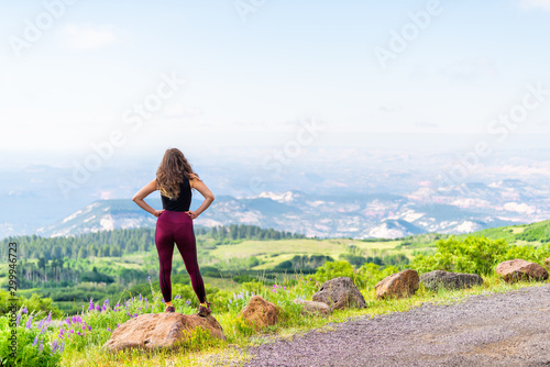 Photography Woman looking at view of canyon formations landscape on highway 12 scenic road b