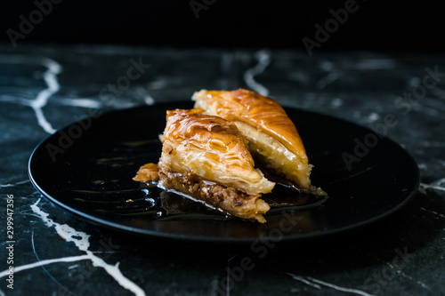 Homemade Turkish Dessert Organic Baklava with Honey photo