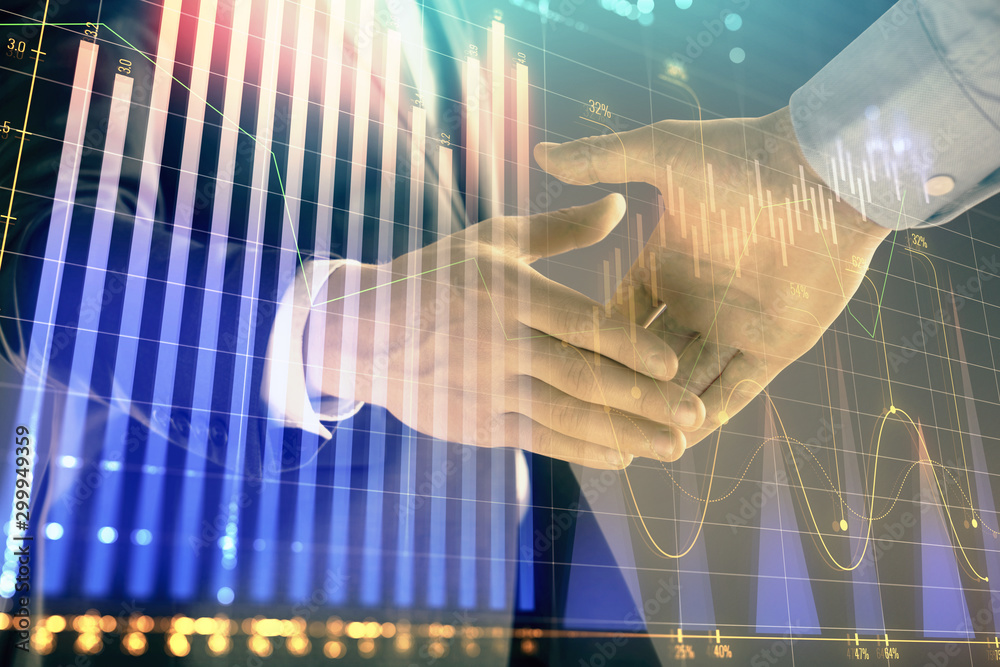 Multi exposure of forex graph on abstract background with two businessmen handshake. Concept of success on stock market