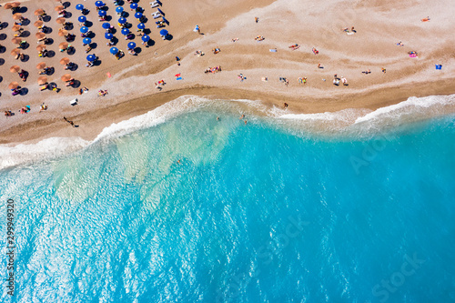 famous Ellie beach in Rhodes. sunbeds, beach, sand, waves, top view from drone. The island of Rhodes Greece