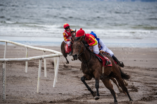 Horse racing action on the beach, west coast of Ireland