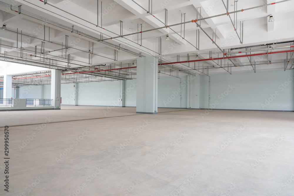Space perspective of concrete structure inside large warehouse Space perspective of concrete structure inside large warehouse