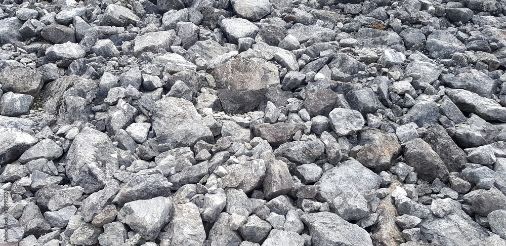 Group of gray stone or rock on ground for background or wallpaper - Hard material add Heavy object Group of gray stone or rock on ground for background or wallpaper - Hard material add Heavy object