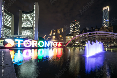 Nathan Phillips Square at night with Toronto Sign and City Hall Building
