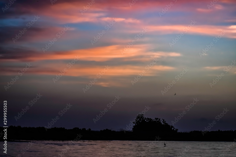 sunrise clouds over lake
