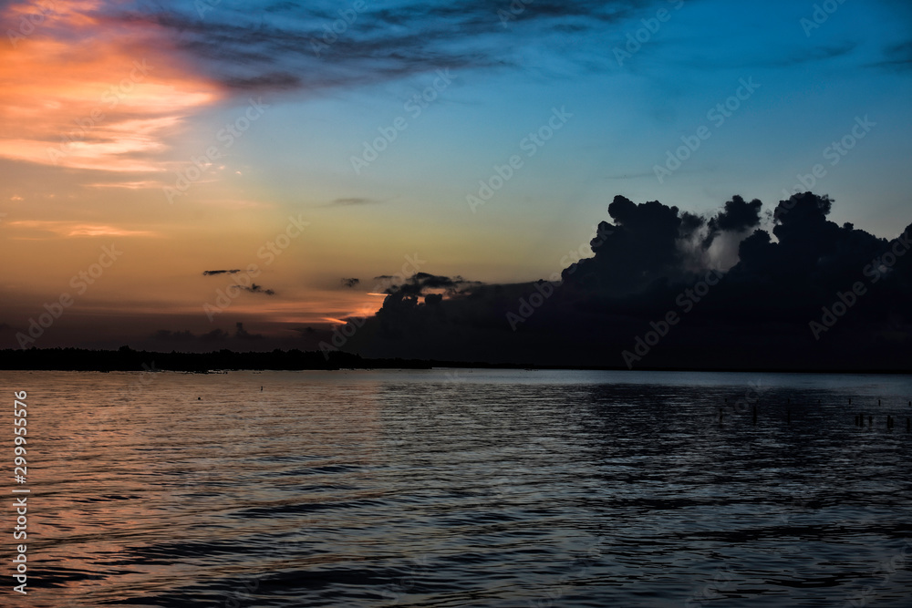 clouds over lake at dawn