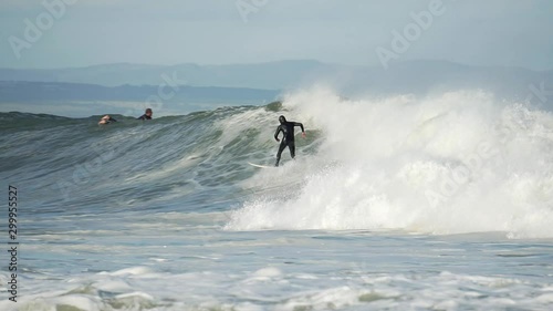Surfer riding Supertubes surf in Jeffreys bay South Africa