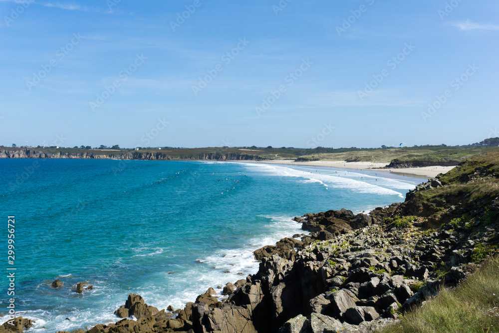 Plage des Blancs Sablons beach on the west coast of Brittany landscape view with surfers
