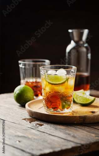Strong golden rum with lime and ice