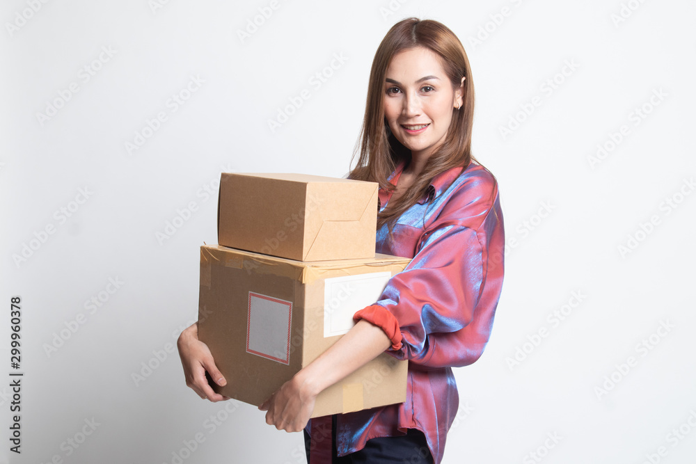 Delivery, relocation and unpacking. young asian woman holding cardboard box. Delivery, relocation and unpacking. young asian woman holding cardboard box.