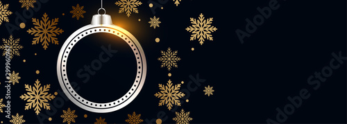 beautiful christmas ball with golden snowflakes black banner